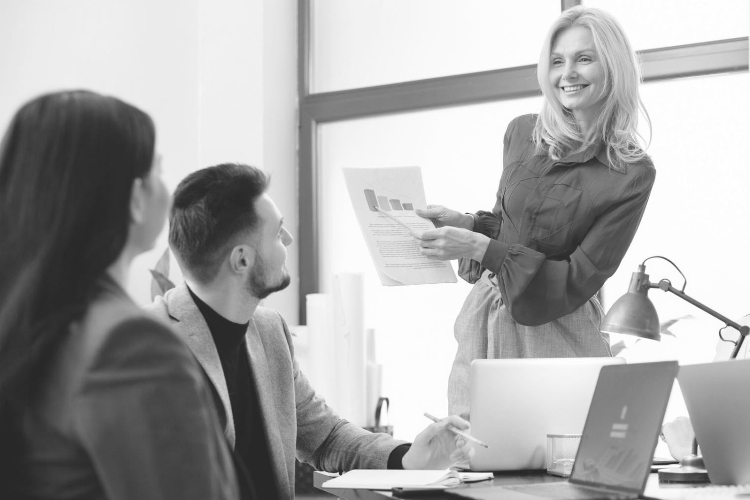 Professional financial consultation meeting with documents and planning materials